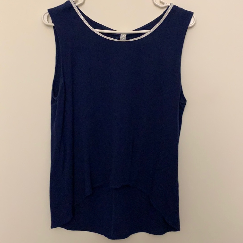Cute blue sleeveless top with silver trimming